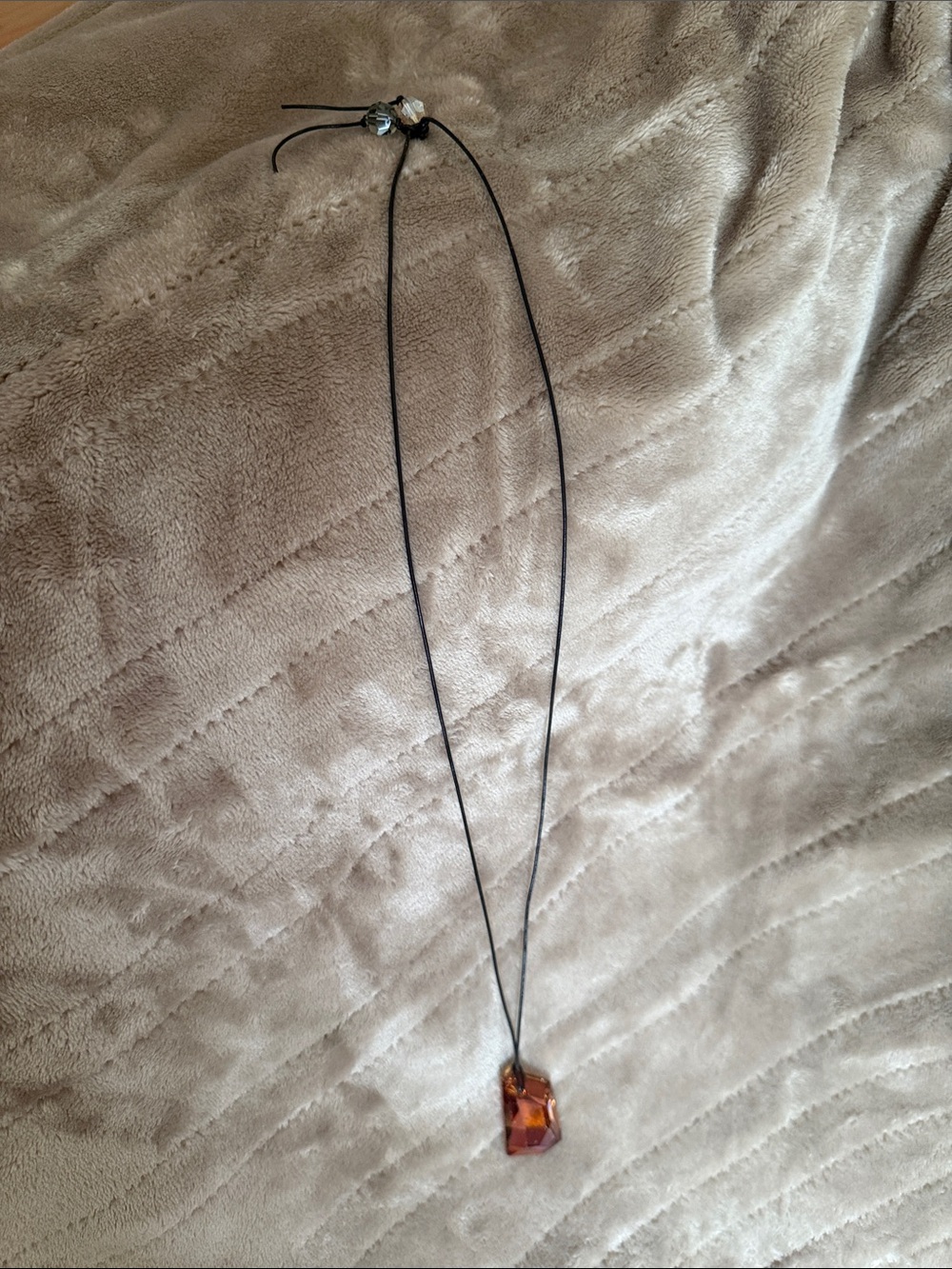 Swarovski Touchstone Amber-Tone Pendant on Black Cord Necklace
